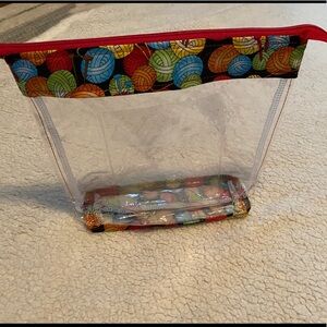 Cute plastic lined storage/make up bag!